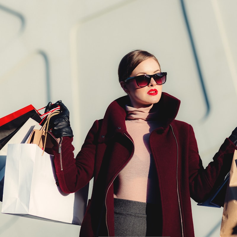 Person carrying shopping bags